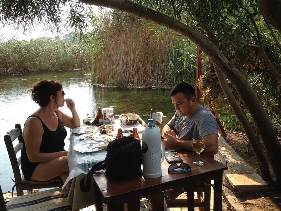 Merrill and Caglar eating outdoors at Yenice Vadi