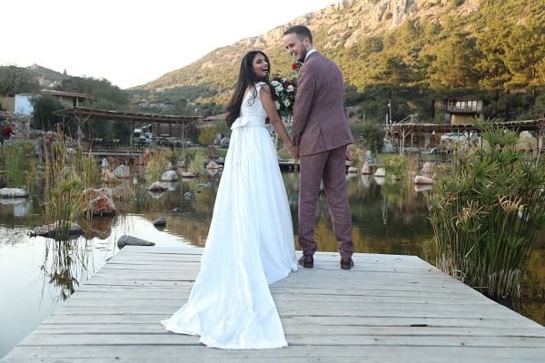 Bride and groom by the lake at Yenice Vadi